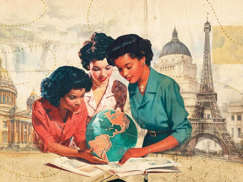 3 women looking at an open book and a globe